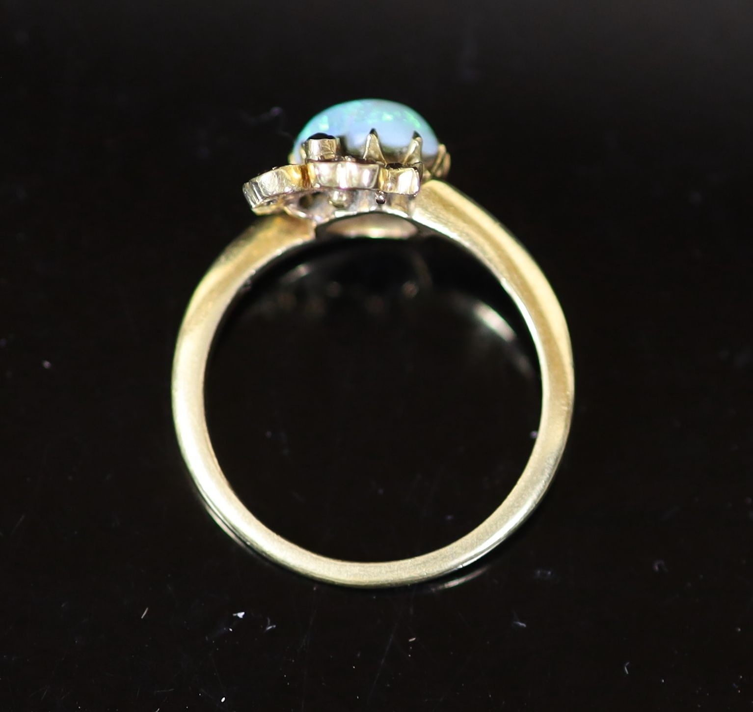 A late Victorian gold, heart shaped opal and diamond set crossover ring